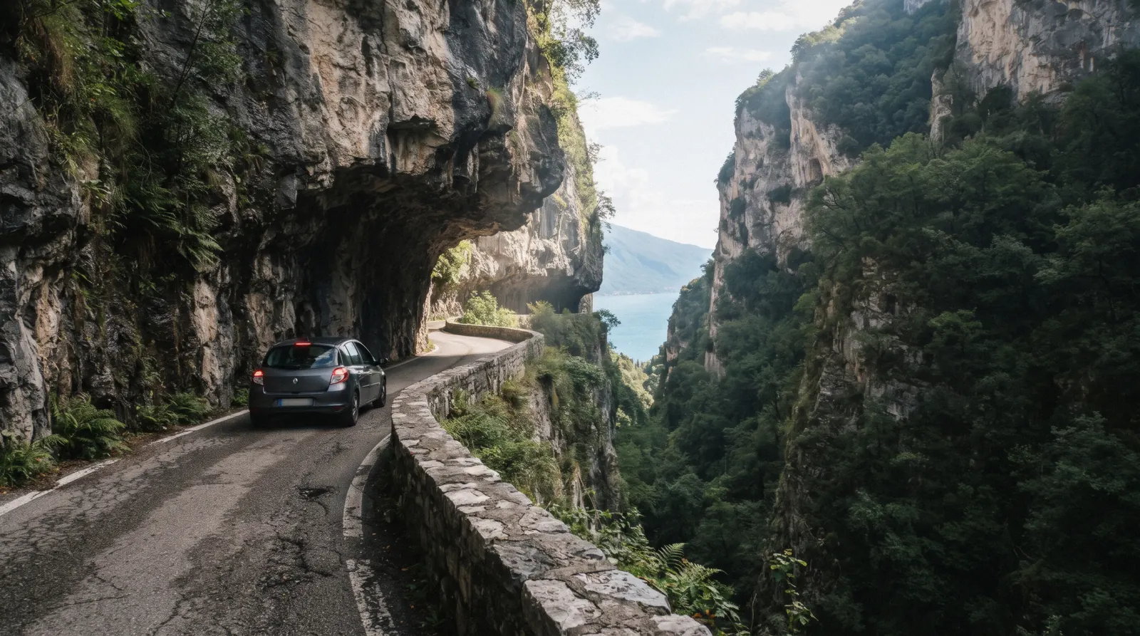 The Strada della Forra gorge road at Tremosine above Lake Garda, Italy, cut into the rock walls of the Brasa gorge