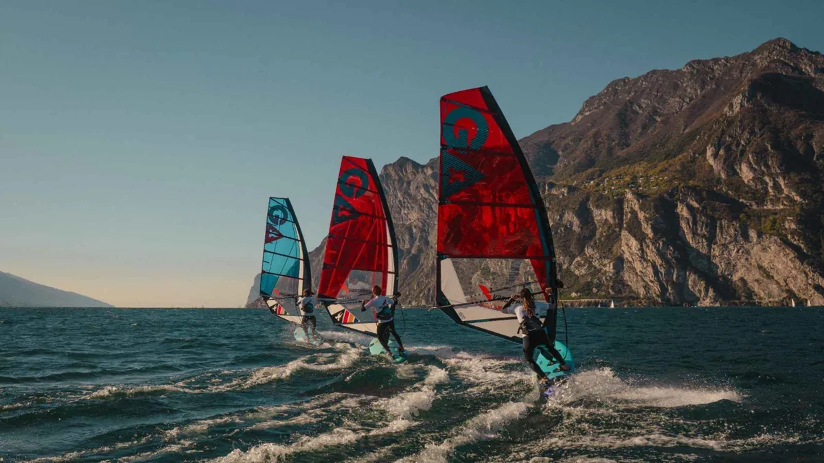 A windsurfer on the water off Torbole at the north end of Lake Garda