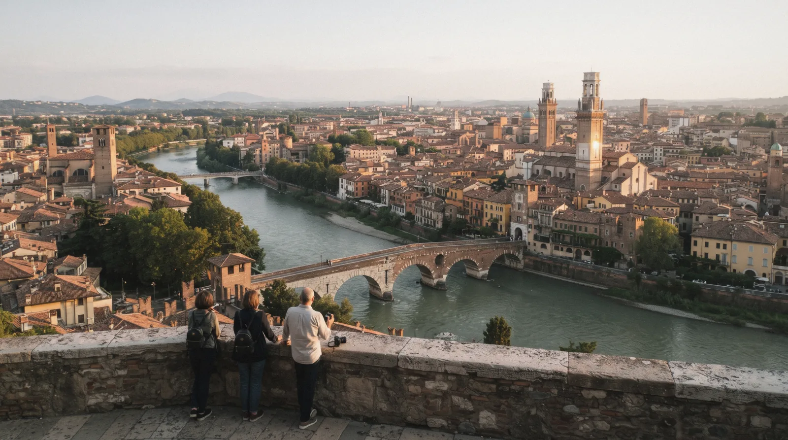 Ponte Pietra over the Adige in Verona at sunset, the city a day trip from Lake Garda, Italy
