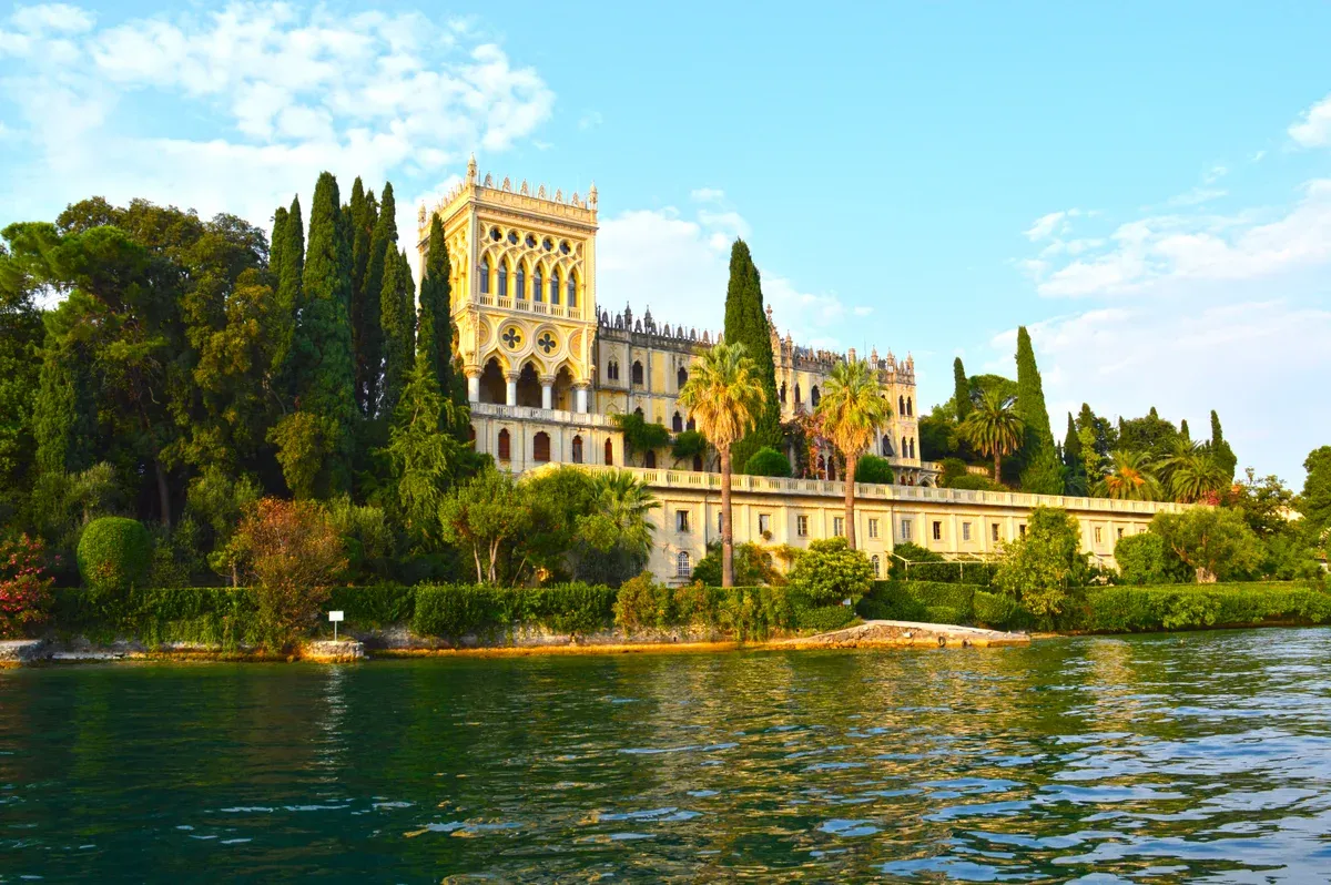 Villa Borghese Cavazza seen from the water on Isola del Garda, Lake Garda, Italy