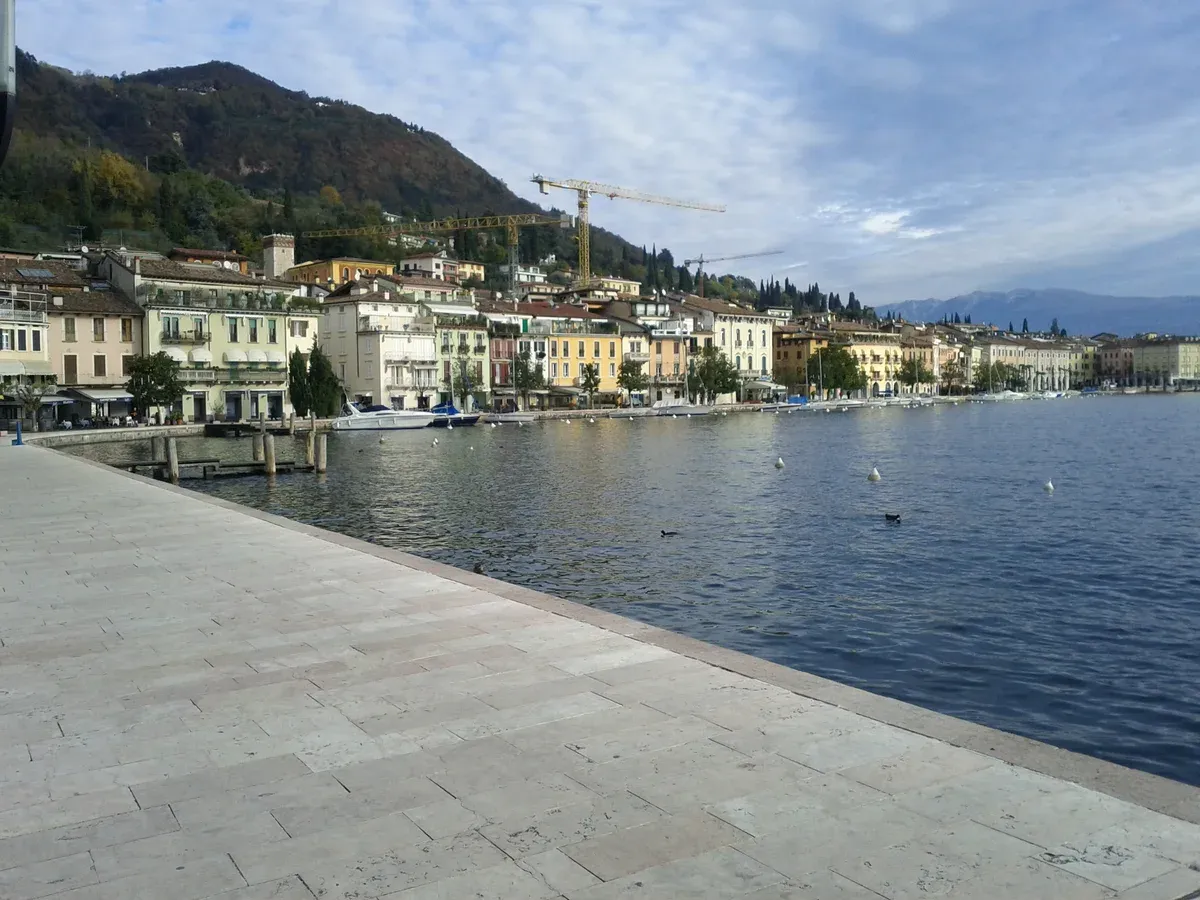 The Lungolago promenade of Salò, Italy, on Lake Garda, with the town front along the water