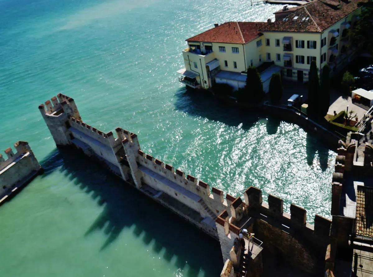 The fortified dock of the Scaligero Castle seen from the keep in Sirmione, Lake Garda, Italy