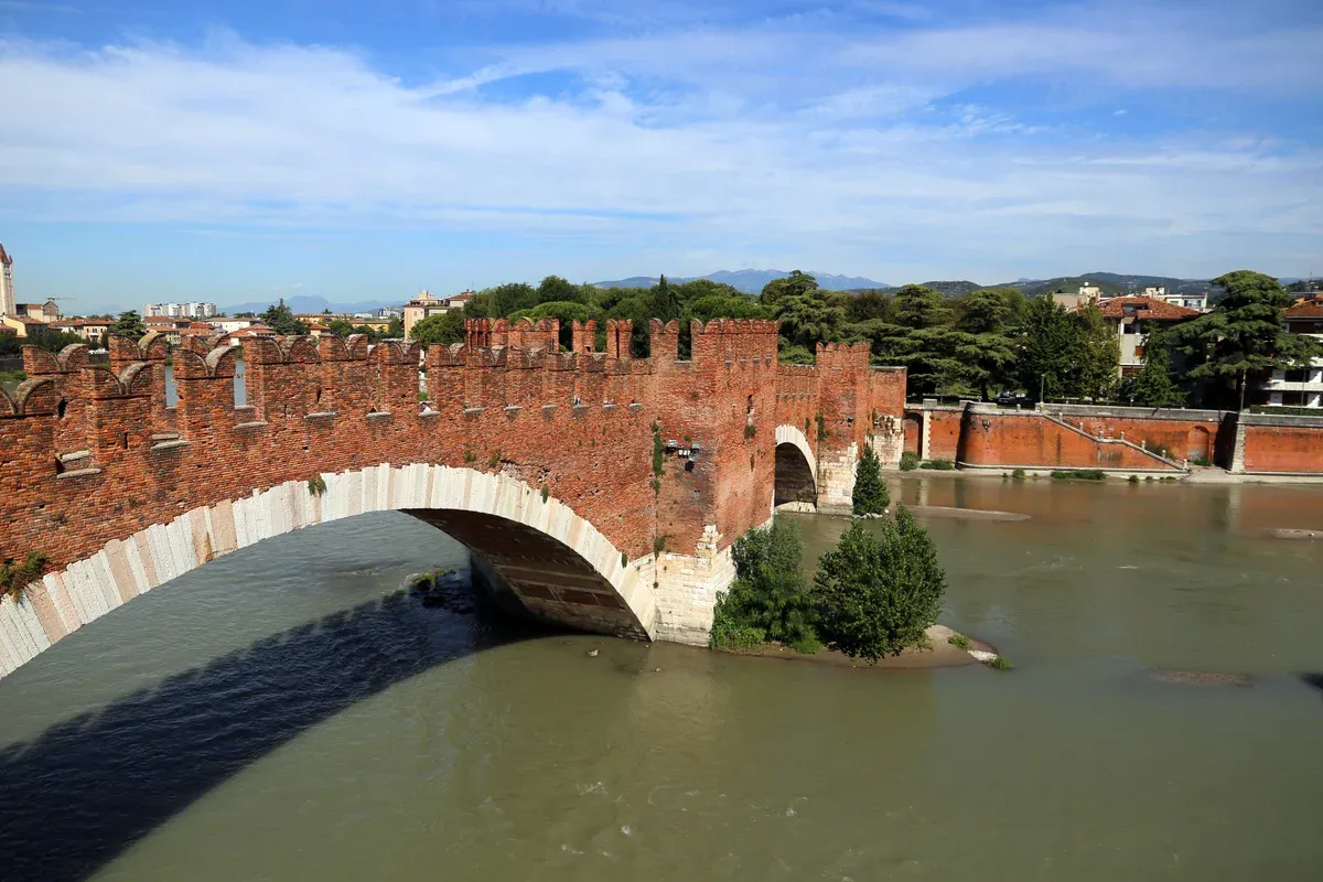 The fortified brick bridge of Castelvecchio over the Adige in Verona, Italy